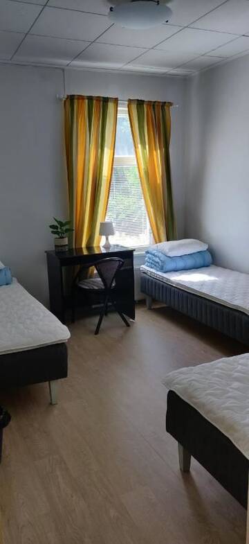 Фото номера Трехместный номер Гостевой дом Wanha Karhunmäki г. Karhunmäki 6